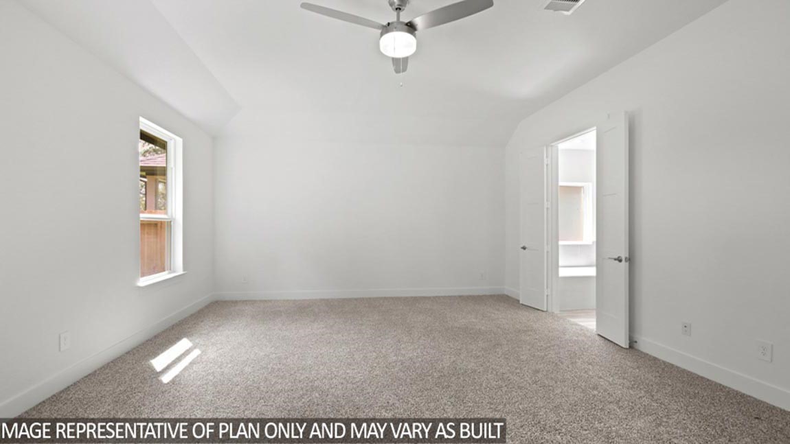 15219 Riverside Drive Baytown, TX 77523 - Photo 4 of 14 an empty room with windows and closet
