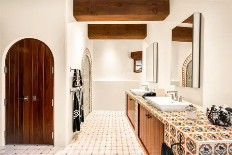 a bath tub sitting in front of a window
