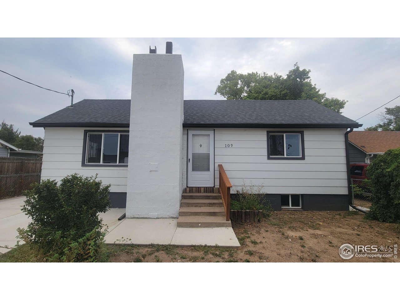 a black and white photo of a house