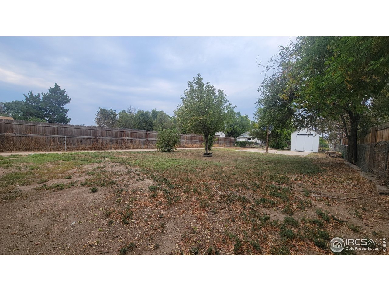 109 4th Street Gilcrest, CO 80623 - Photo 17 of 22 a black and white photo of a house
