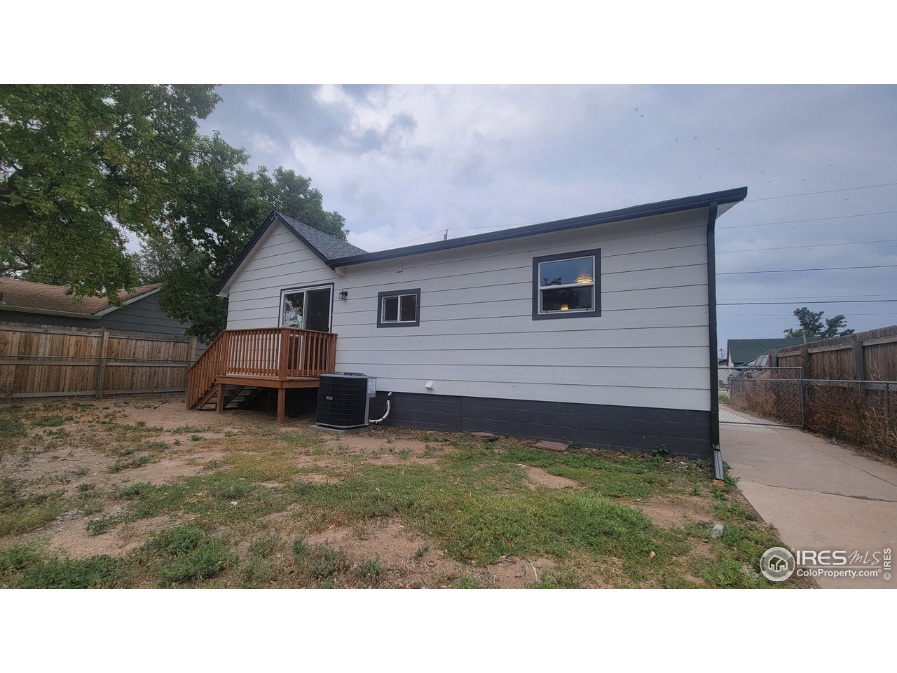 109 4th Street Gilcrest, CO 80623 - Photo 18 of 22 a view of a backyard