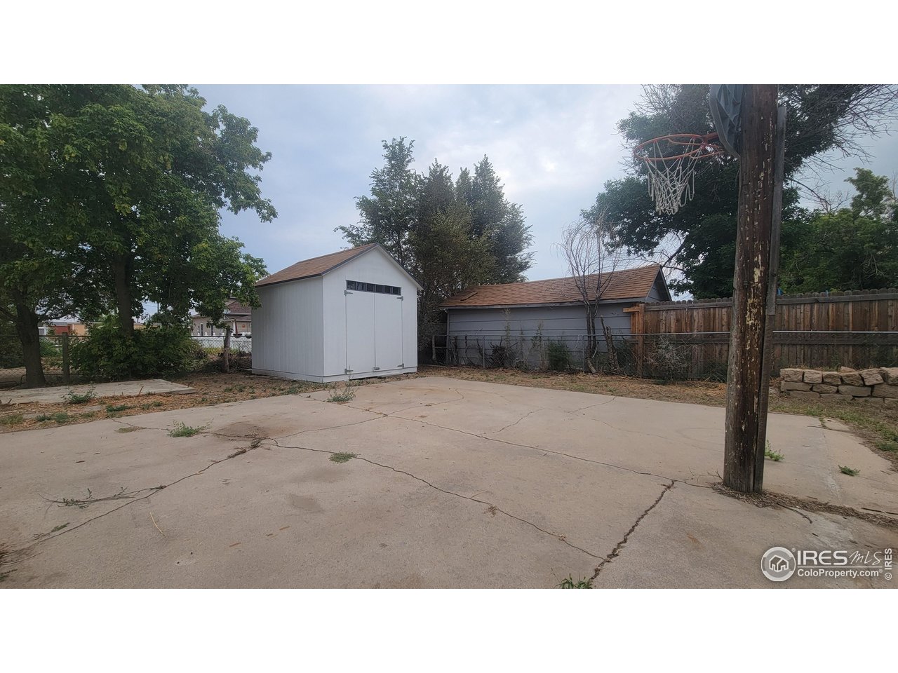 109 4th Street Gilcrest, CO 80623 - Photo 20 of 22 a black and white photo of a house