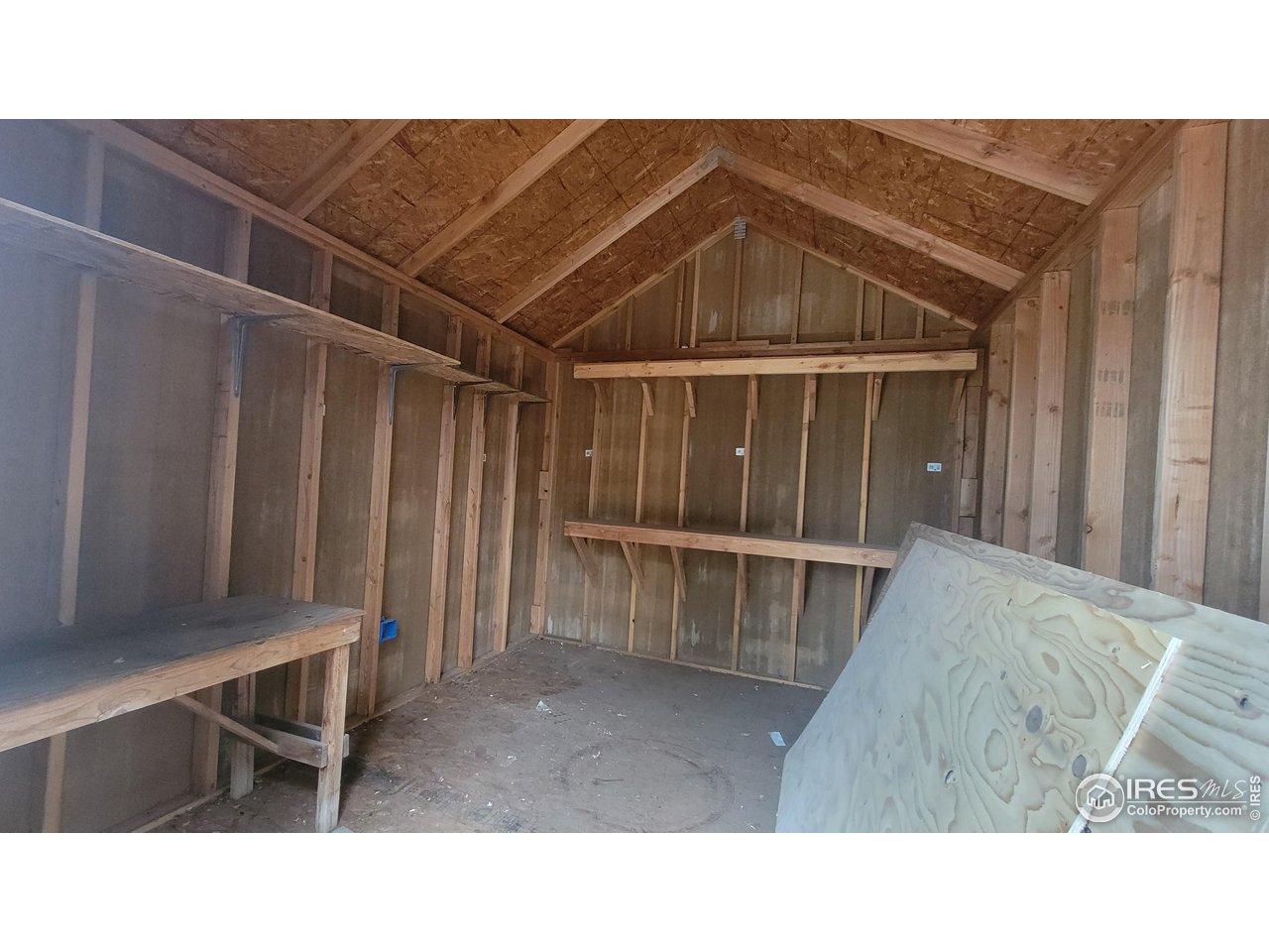109 4th Street Gilcrest, CO 80623 - Photo 22 of 22 a black and white photo of a living room