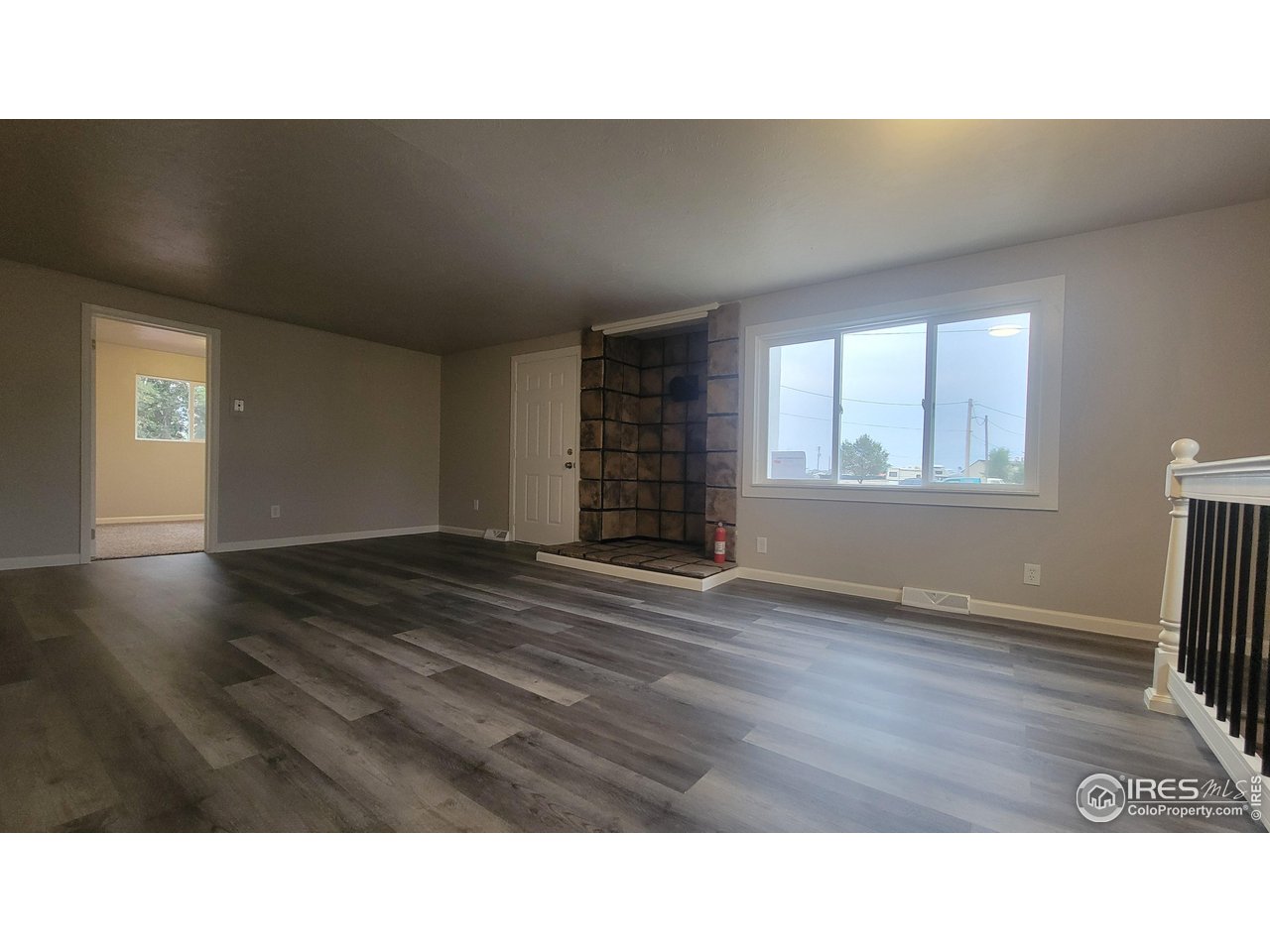 109 4th Street Gilcrest, CO 80623 - Photo 6 of 22 a kitchen with a sink and a window