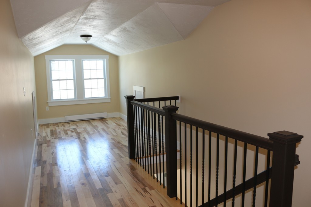 181 Westboro Road Upton, MA 01568 - Photo 13 of 15 a view of hallway with wooden floor