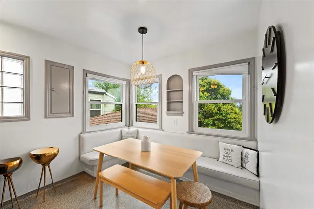 a view of a livingroom with furniture and window