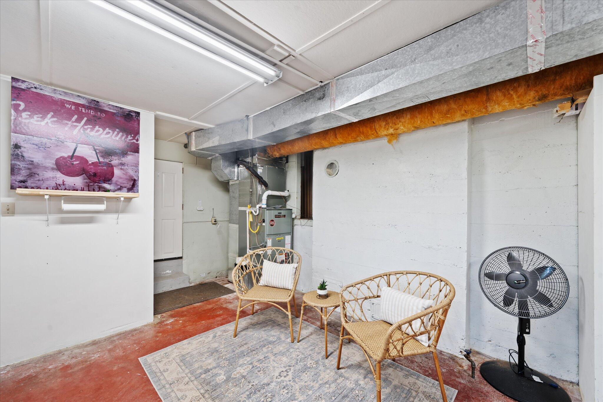 1901 Chestnut Street Redding, CA 96001 - Photo 26 of 39 a view of a hallway with paintings on the wall
