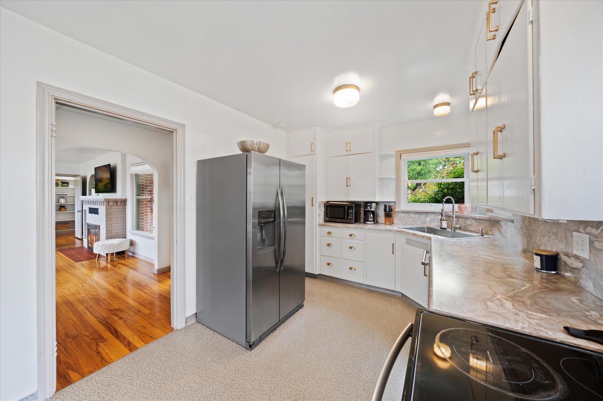 1901 Chestnut Street Redding, CA 96001 - Photo 10 of 39 a kitchen with a refrigerator and a sink