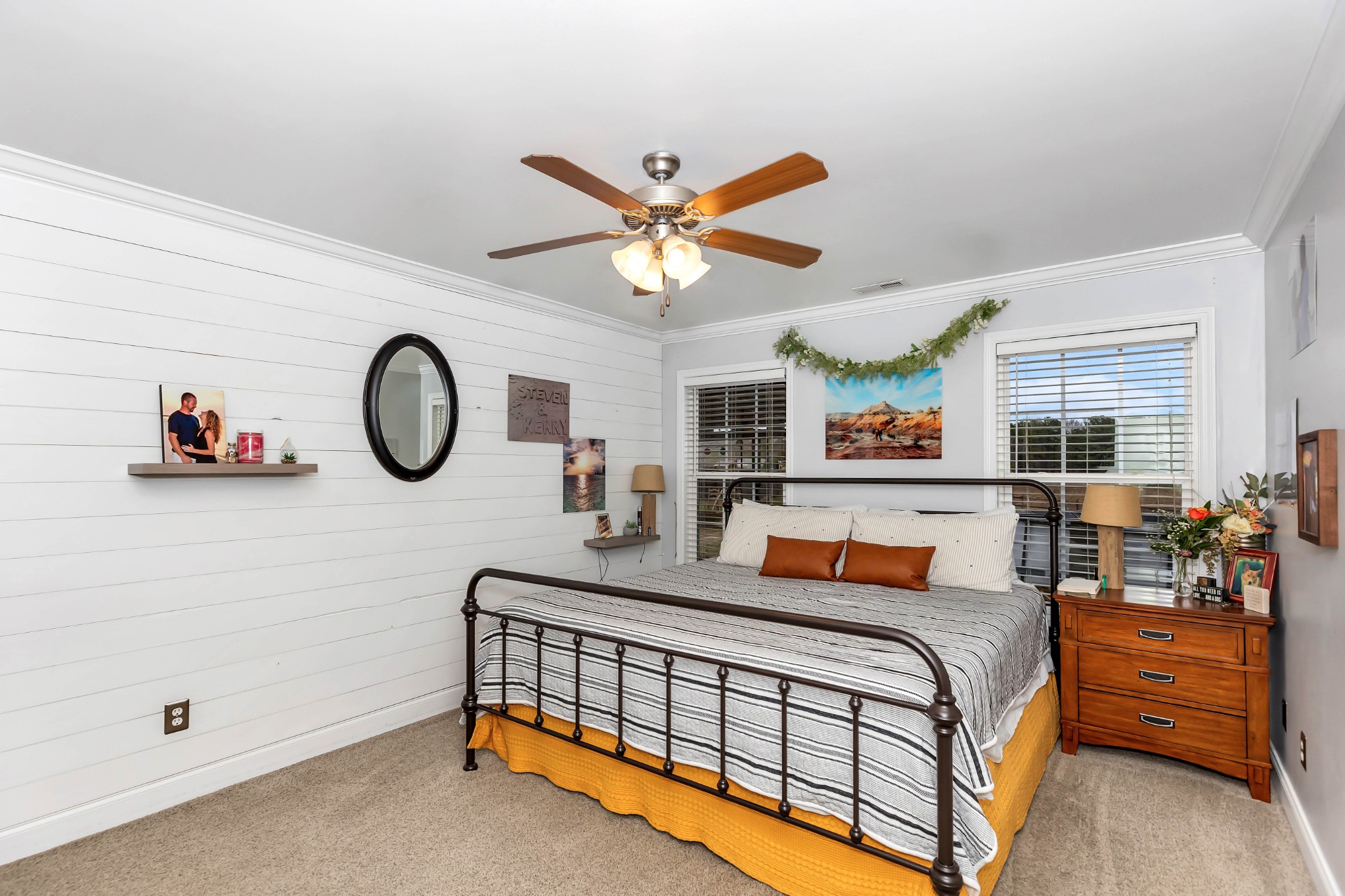 25518 Clem Road Elkmont, AL 35620 - Photo 13 of 24 a bedroom with furniture and a chandelier