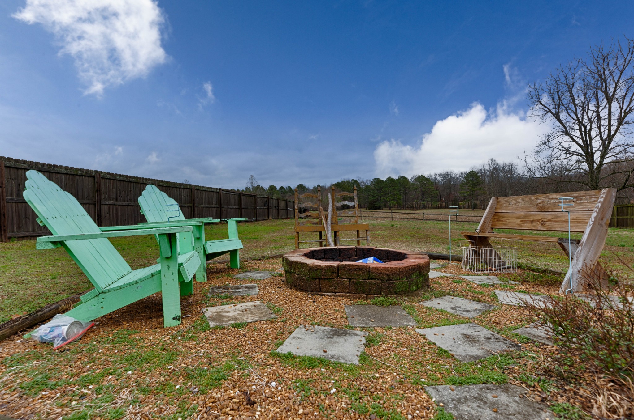 25518 Clem Road Elkmont, AL 35620 - Photo 23 of 24 a backyard of a house with table and chairs