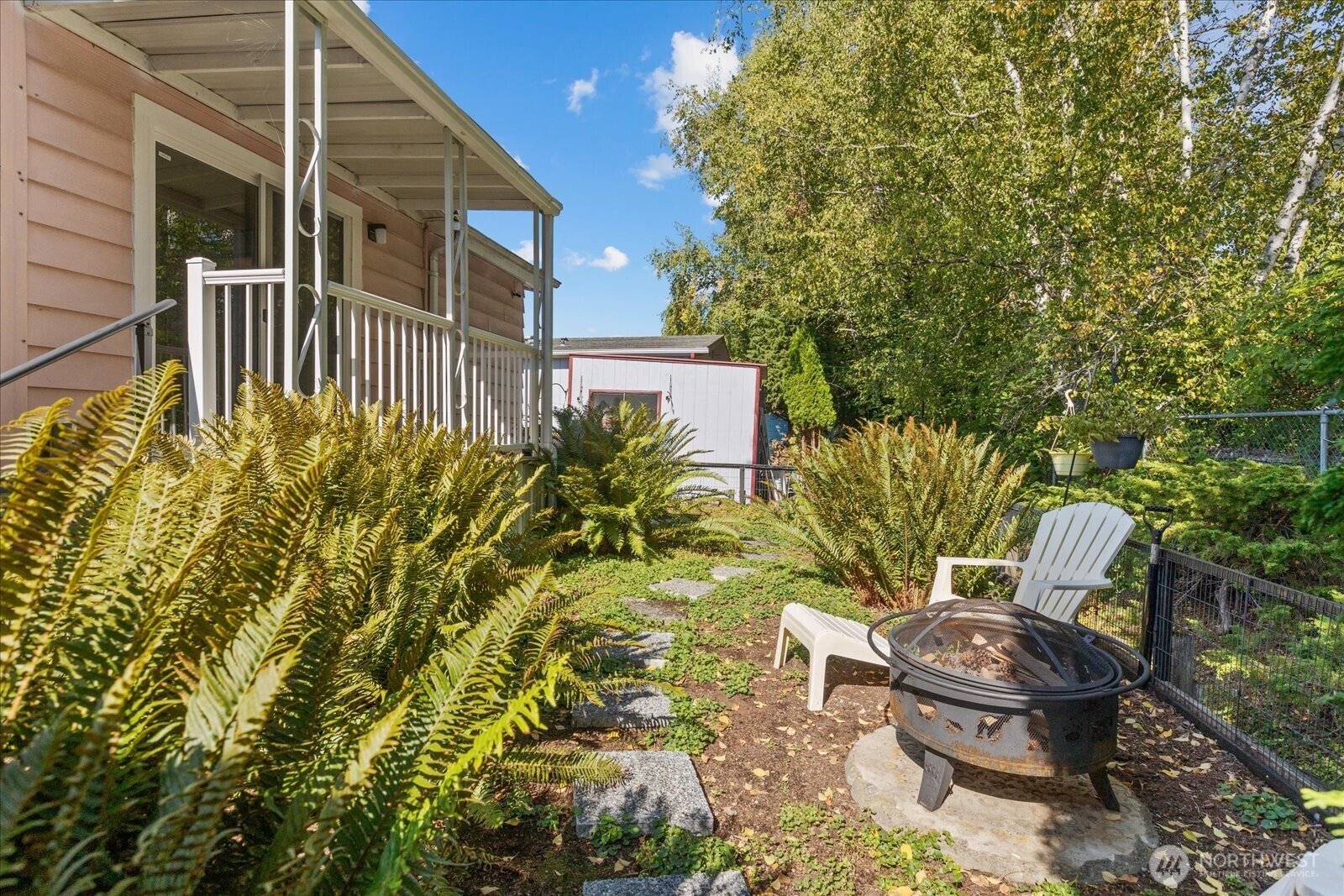 815 124th Street Southwest, Unit 133 Everett, WA 98204 - Photo 26 of 38 a view of a backyard with plants and garden