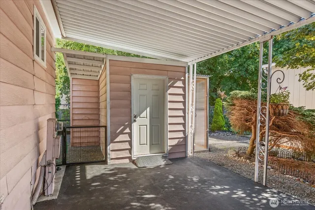 a view of a pathway in front of house