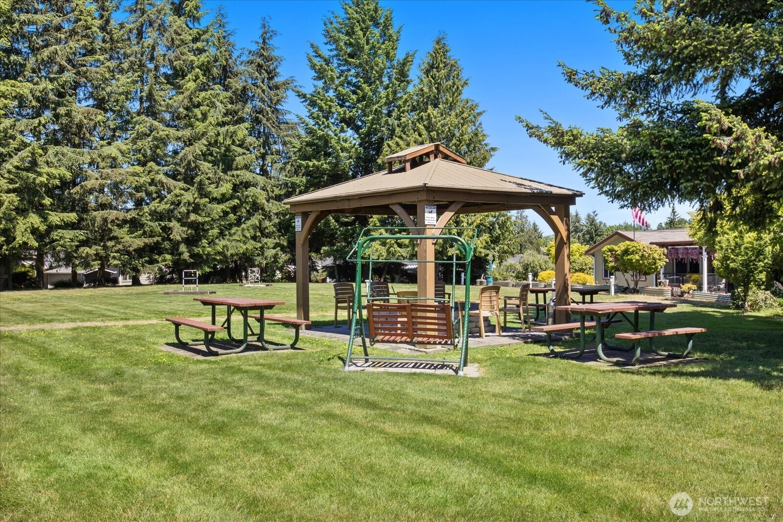 815 124th Street Southwest, Unit 133 Everett, WA 98204 - Photo 34 of 38 a view of a park with bench and garden