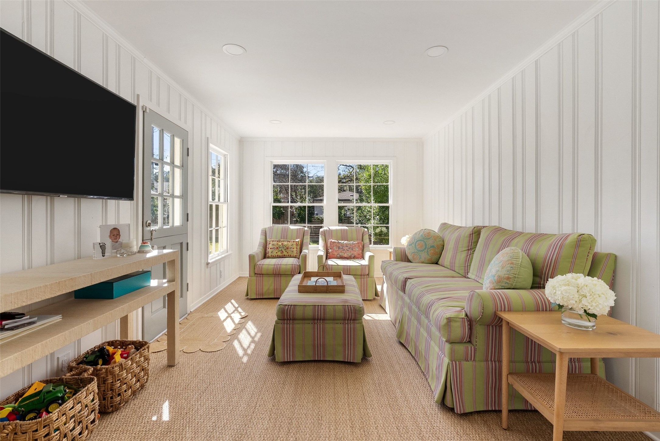 3311 Bonnie Road Austin, TX 78703 - Photo 11 of 40 a living room with furniture and a flat screen tv