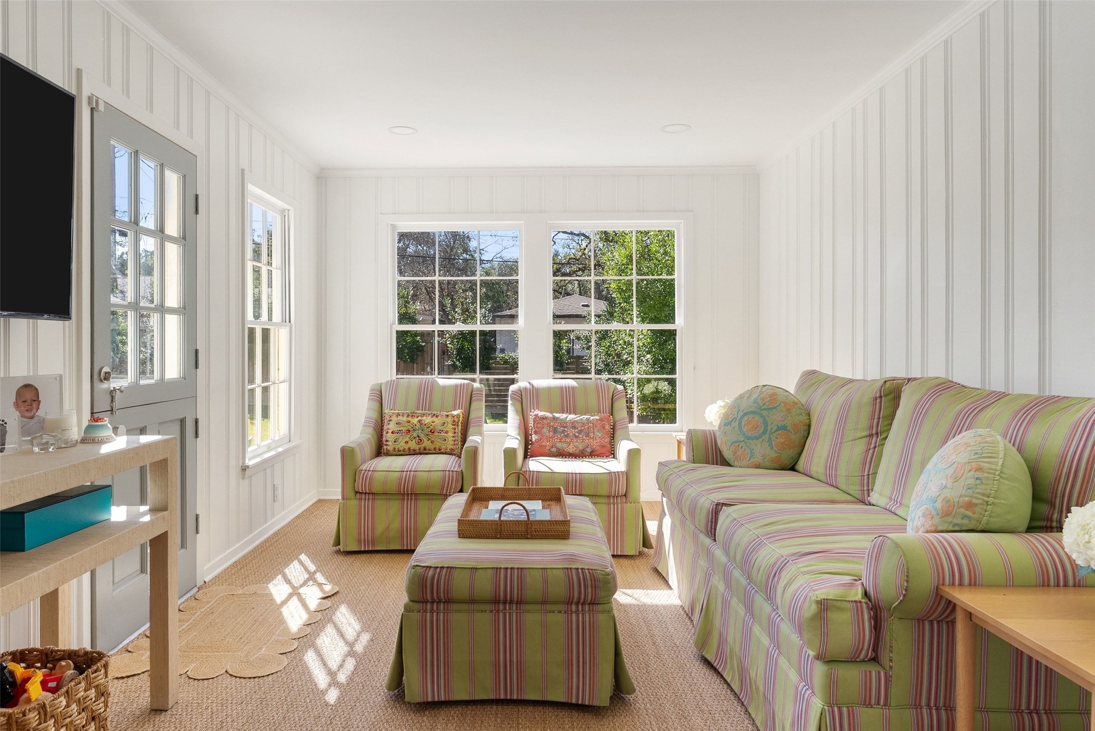 3311 Bonnie Road Austin, TX 78703 - Photo 12 of 40 a living room with furniture and a flat screen tv