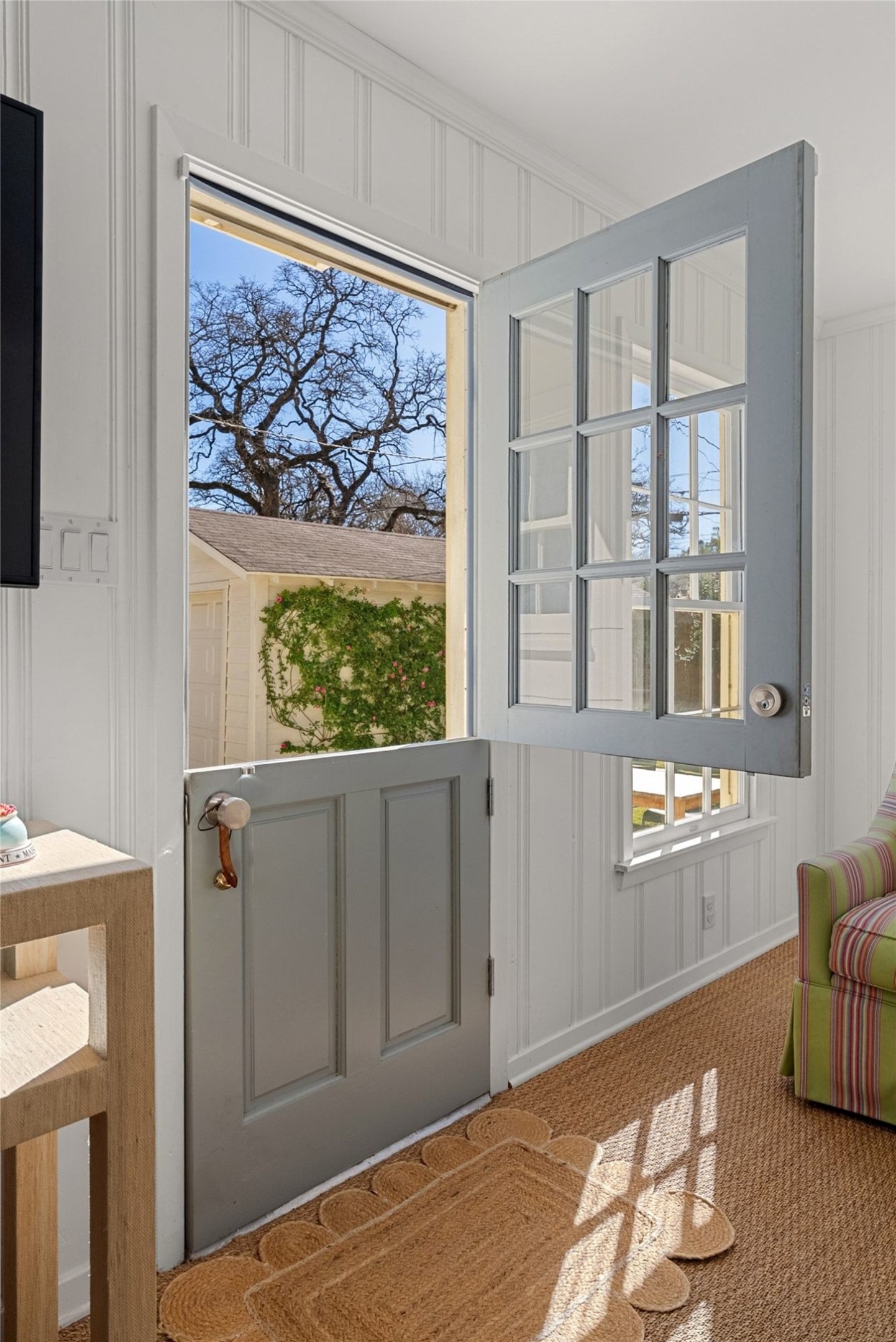 3311 Bonnie Road Austin, TX 78703 - Photo 16 of 40 a bedroom with natural light and wooden floor