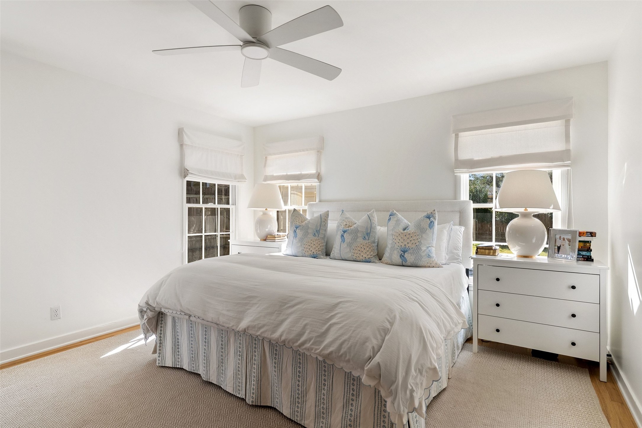 3311 Bonnie Road Austin, TX 78703 - Photo 22 of 40 a bedroom with a large bed and a window