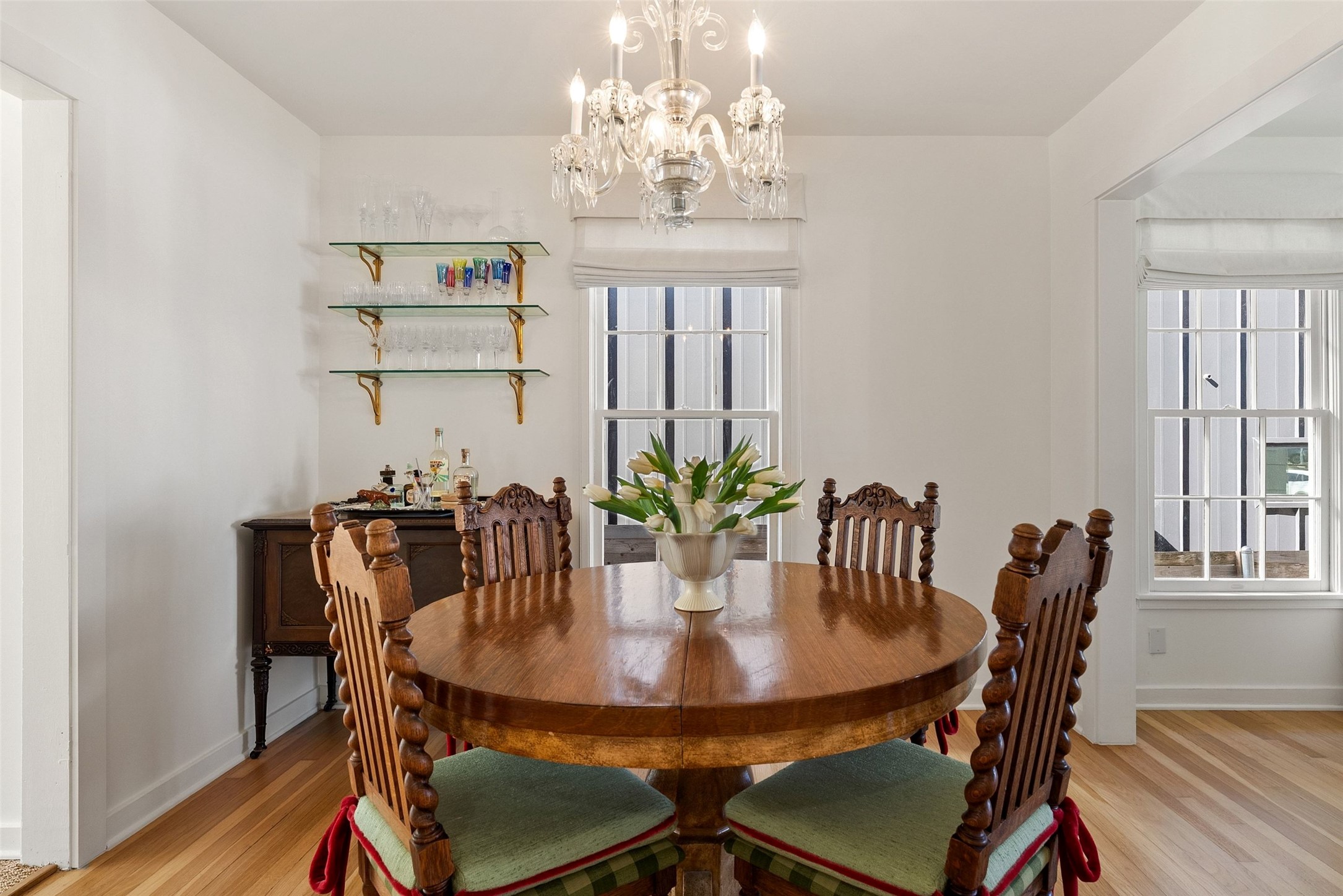 3311 Bonnie Road Austin, TX 78703 - Photo 10 of 40 a view of a dining room with furniture and chandelier