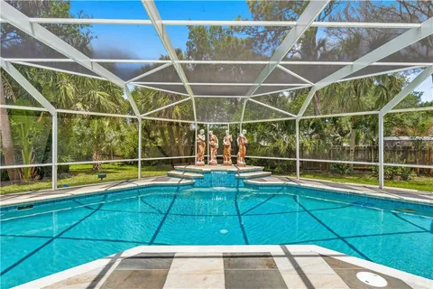 a view of outdoor space with swimming pool