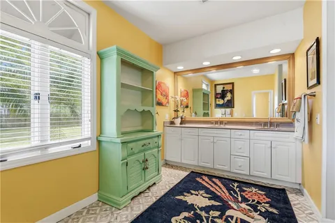 a room with window and mirror
