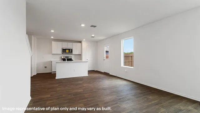 a view of kitchen with wooden floor