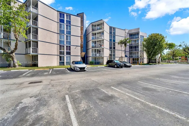 a view of a building with a street