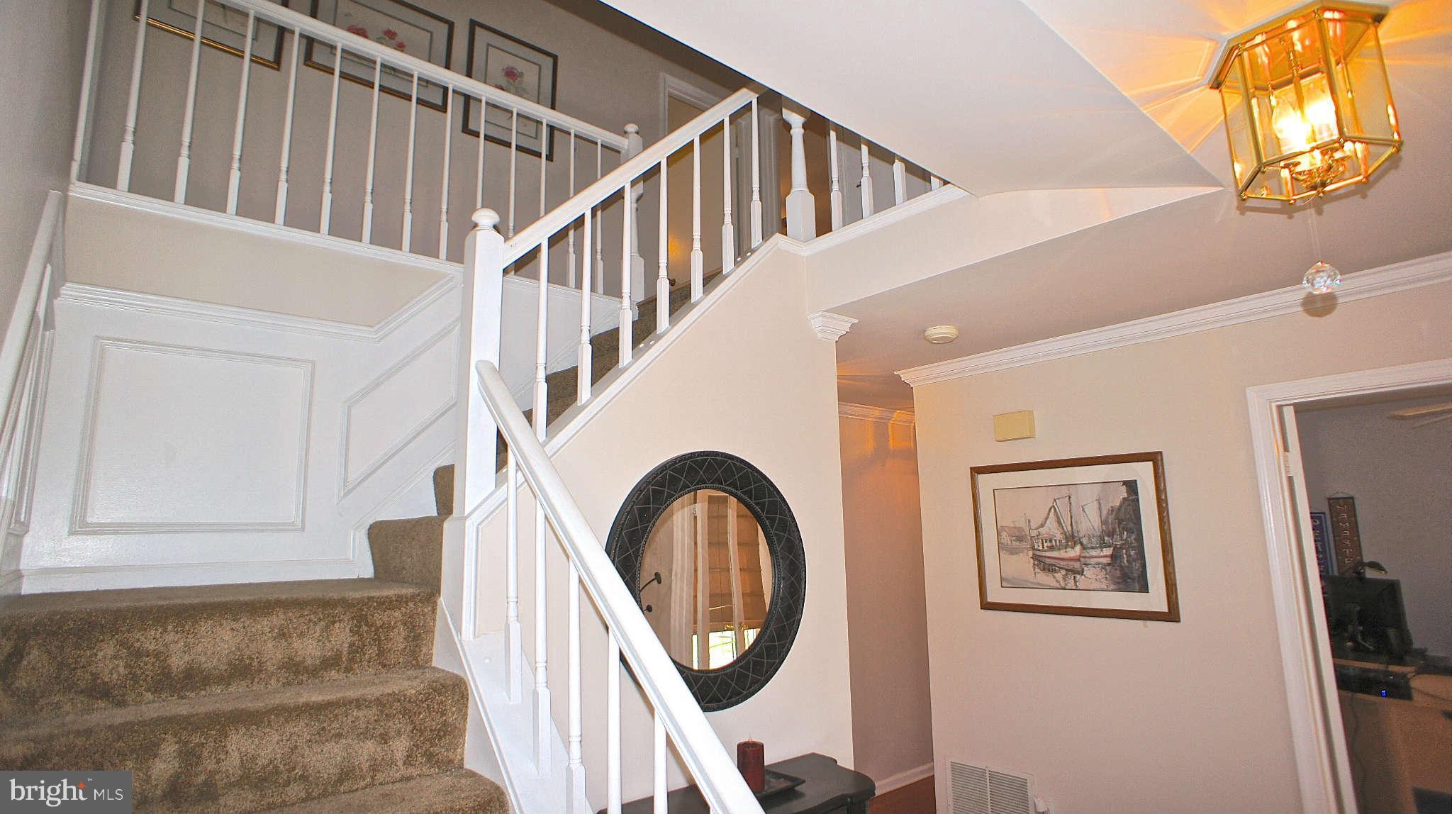 20605 Bell Bluff Road Gaithersburg, MD 20882 - Photo 10 of 18 Wainscoting and crown molding throughout