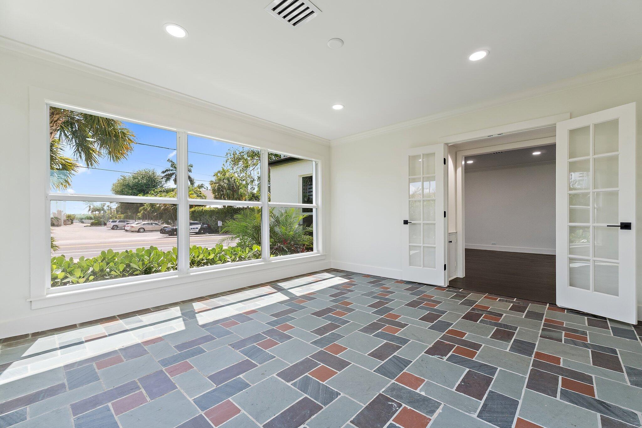 4015 Washington Road West Palm Beach, FL 33405 - Photo 11 of 31 a view of a bedroom with wooden floor and a window