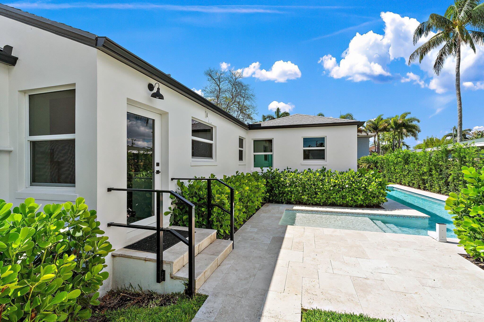 4015 Washington Road West Palm Beach, FL 33405 - Photo 21 of 31 a view of a house with patio