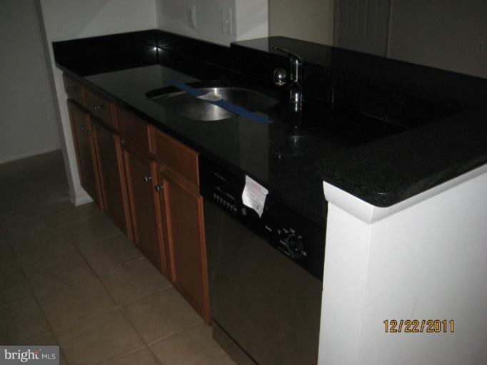11703 Olde English Drive, Unit 11703A Reston, VA 20190 - Photo 15 of 19 a close view of kitchen island