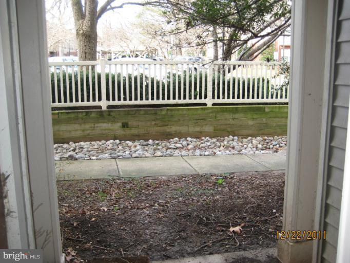 11703 Olde English Drive, Unit 11703A Reston, VA 20190 - Photo 17 of 19 a view of a balcony with a yard