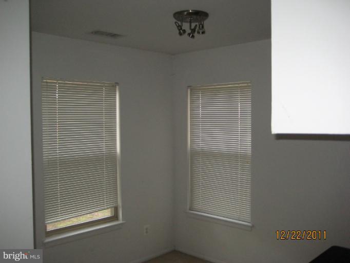 11703 Olde English Drive, Unit 11703A Reston, VA 20190 - Photo 10 of 19 a bathroom with a window