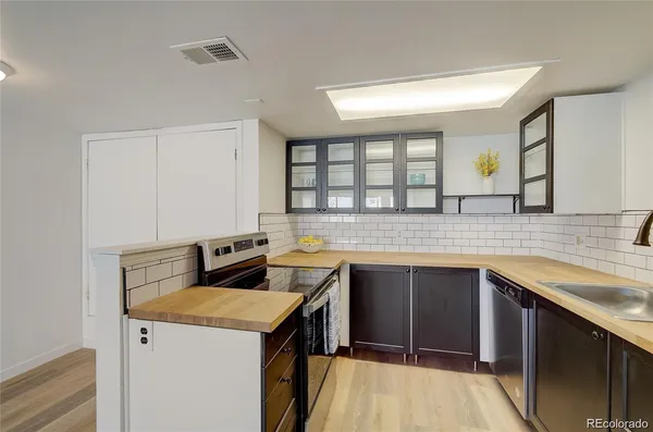 a view of cabinets with sink