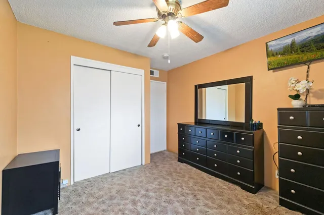 a room with a dresser and a mirror