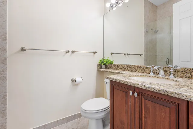 a utility room with sink dryer and washer