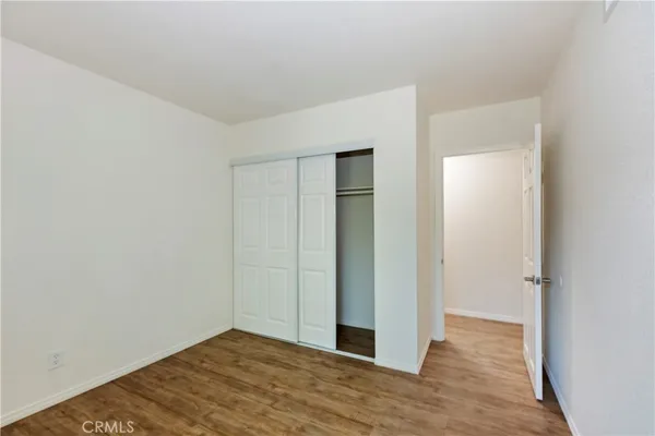 a view of a livingroom with wooden floor