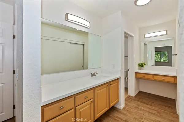 a bathroom with a sink and shower