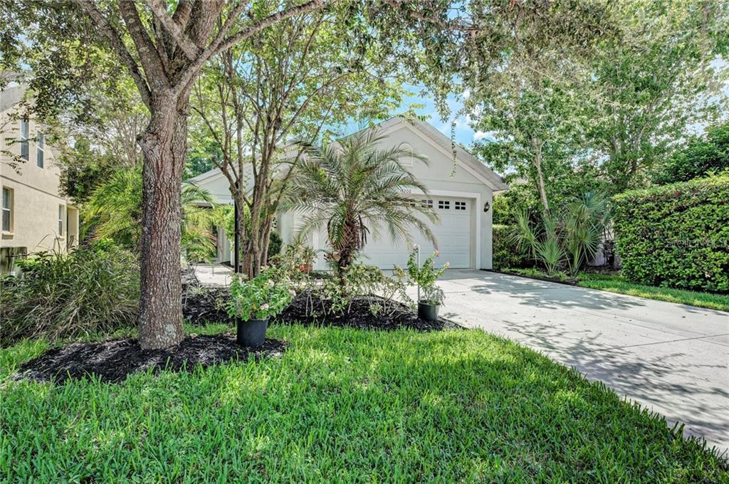 14206 Tree Swallow Way Lakewood Ranch, FL 34202 - Photo 1 of 1 SIDE ANGLE VIEW OF THE FRONT OF THE HOME
