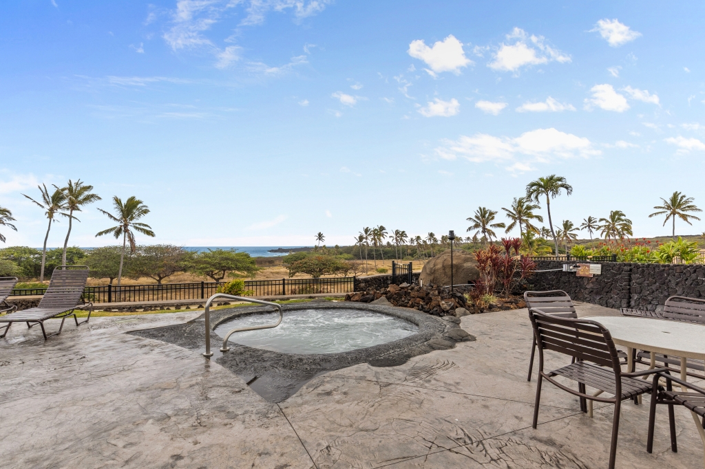 95-789 Ninole Loop Road, Unit 42 Naalehu, HI 96772 - Photo 25 of 30 an outdoor space with seating