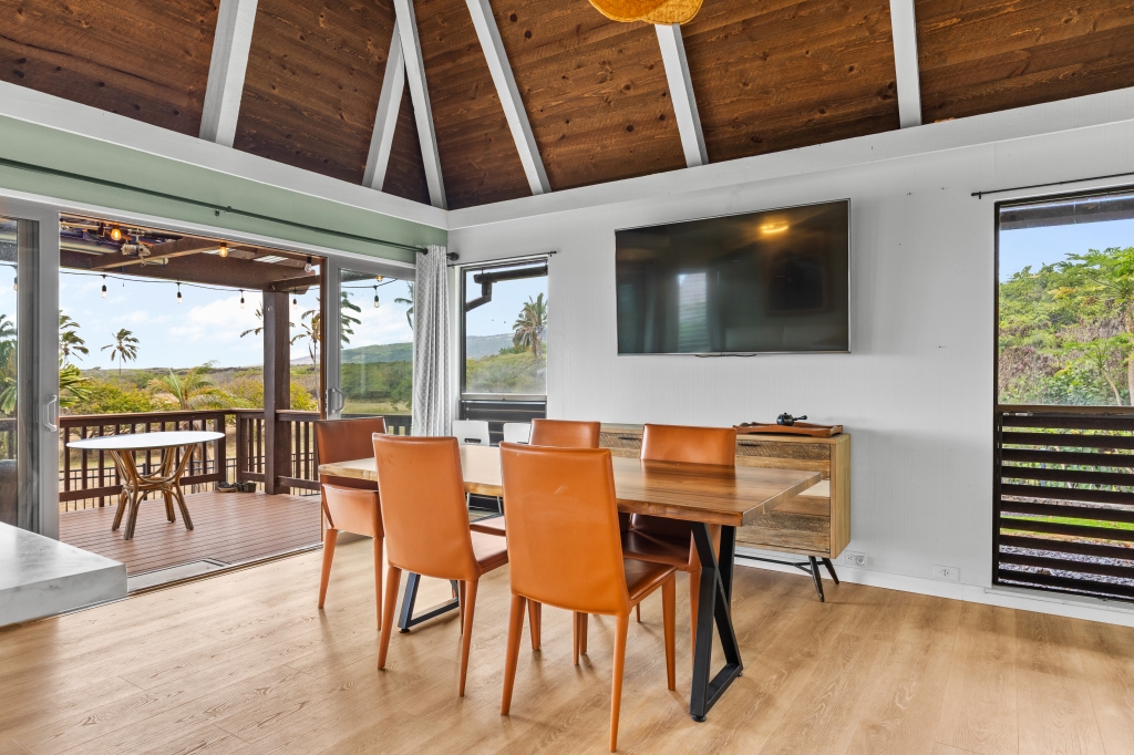 95-789 Ninole Loop Road, Unit 42 Naalehu, HI 96772 - Photo 9 of 30 a view of a livingroom with furniture and window