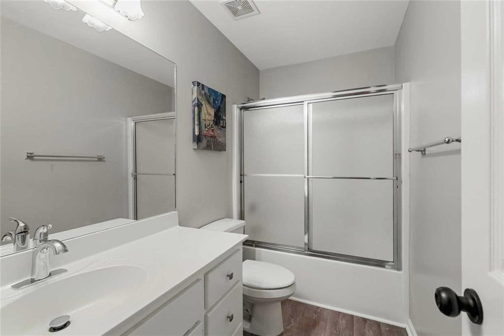2203 Arbor Hill Road Canton, GA 30115 - Photo 51 of 65 a bathroom with a sink toilet and shower