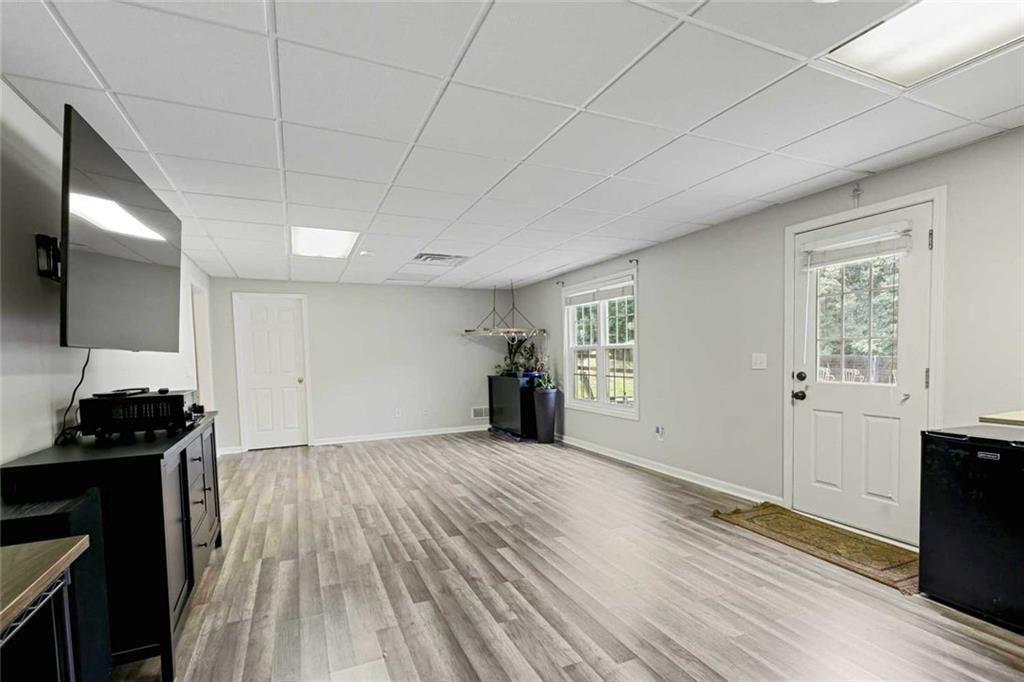 2203 Arbor Hill Road Canton, GA 30115 - Photo 52 of 65 a view of a room with wooden floor