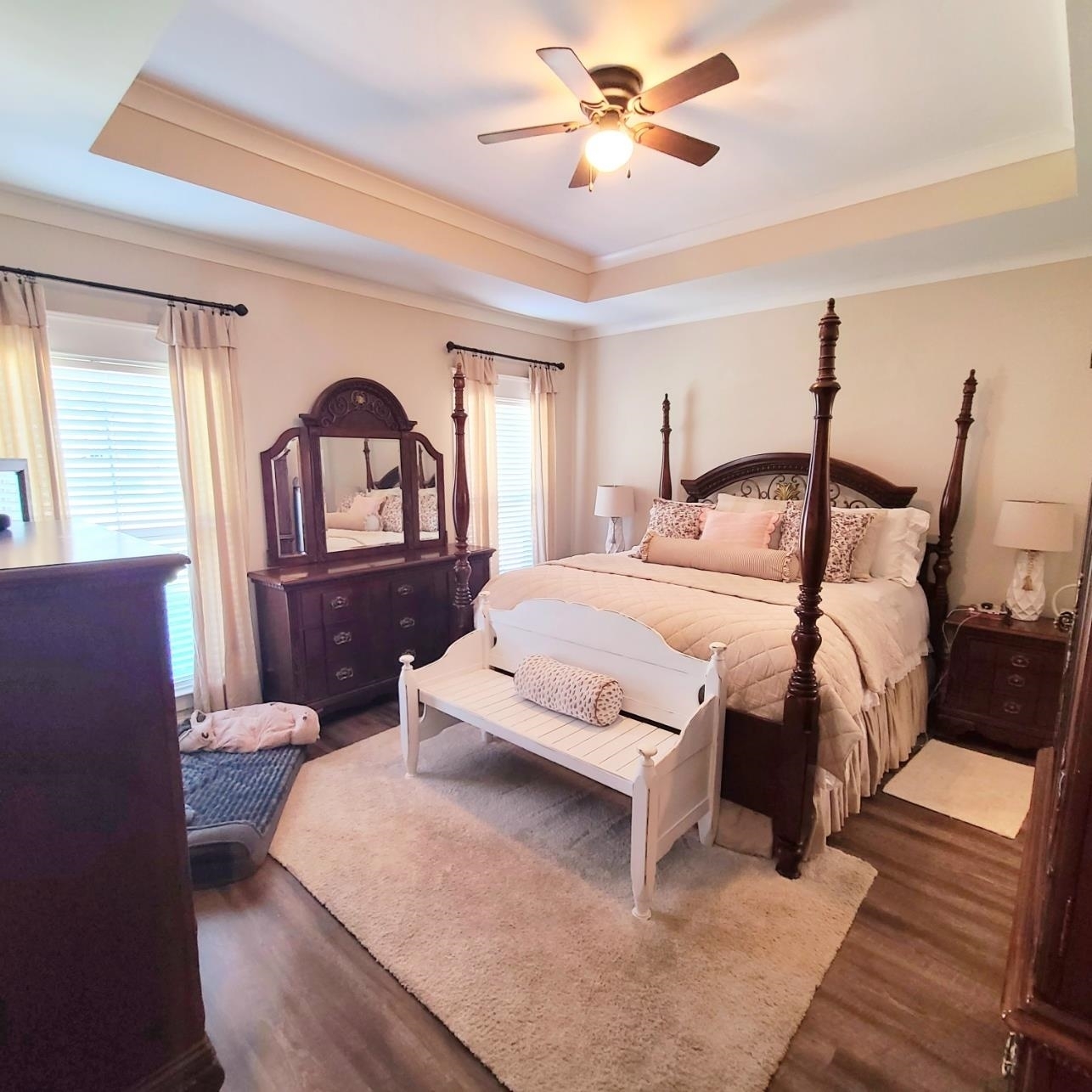 10051 Blackwell Nursery Road Semmes, AL 36575 - Photo 30 of 54 Bedroom featuring a raised ceiling, dark wood-style floors, ceiling fan, and crown molding