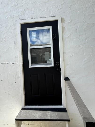 913 Northwest 46th Street, Unit 2 Miami, FL 33127 - Photo 6 of 7 a view of an entryway