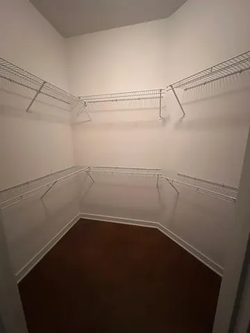 a view of a room with racks on the wall