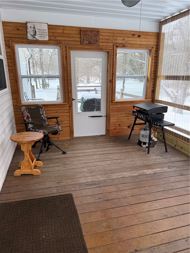 1056 Minard Run Road Rew, PA 16744 - Photo 11 of 50 Rear enclosed porch from kitchen