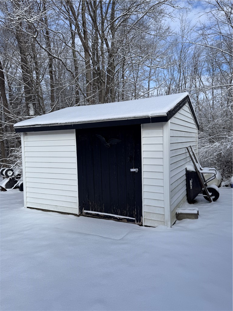 1056 Minard Run Road Rew, PA 16744 - Photo 29 of 50 Shed with concrete flooring