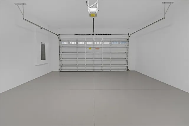 a view of staircase with lots of frames and a rug