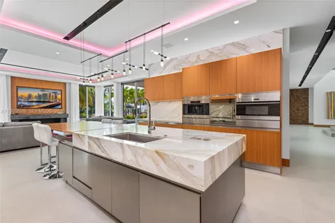 a view of a kitchen with a cabinets and a wooden floor