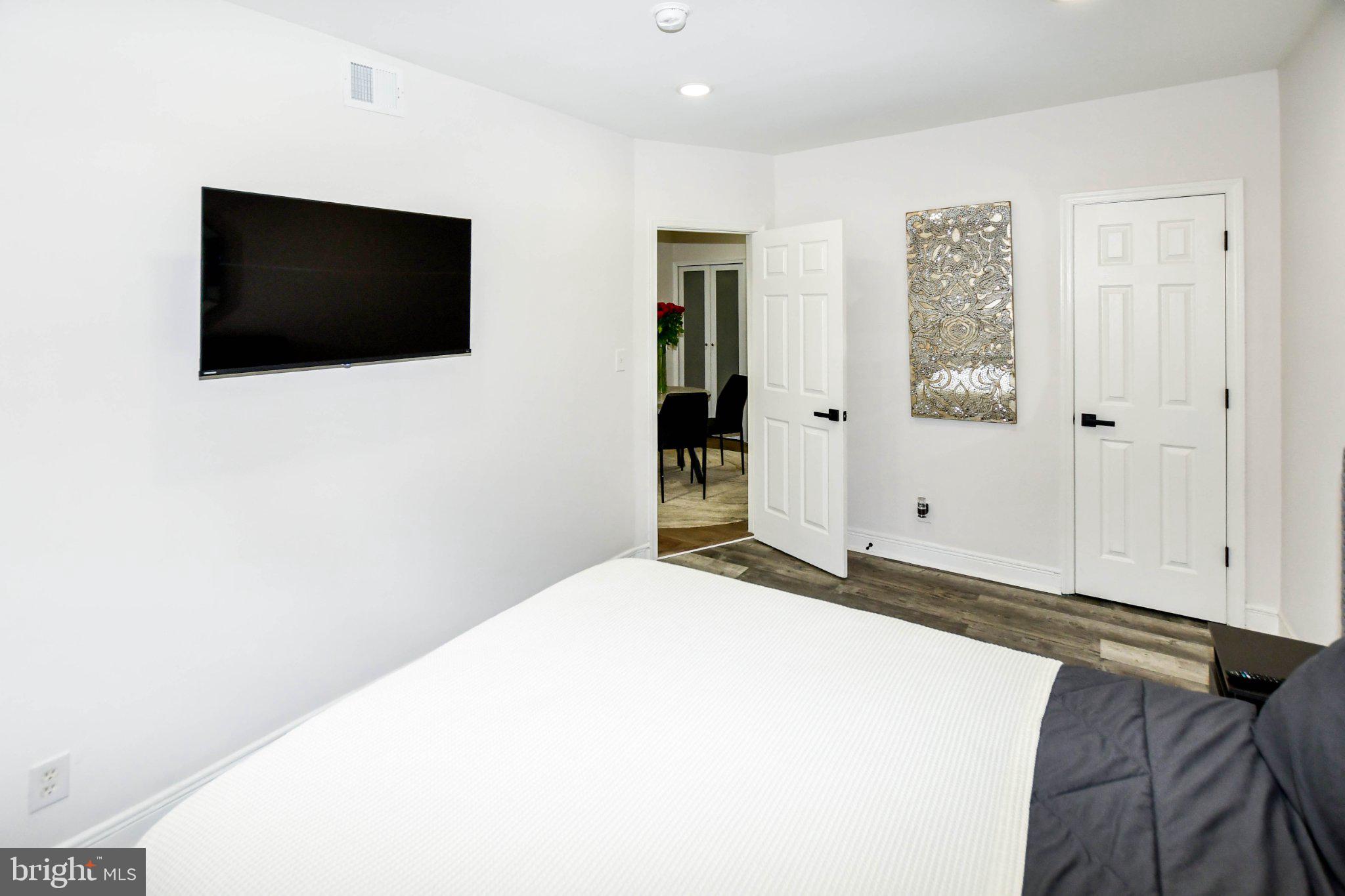554 Newcomb Street Southeast, Unit 4 Washington, DC 20032 - Photo 13 of 20 Modern bedroom with sleek design.